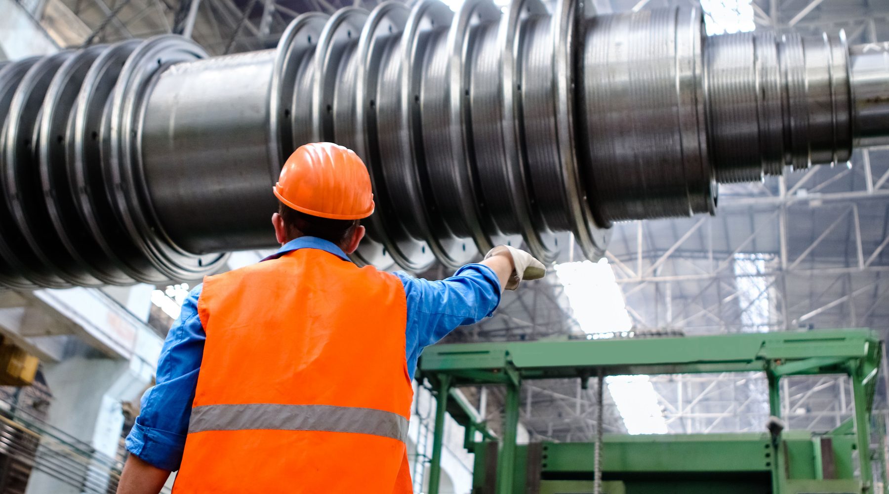 Construction professional performing an industrial site inspection