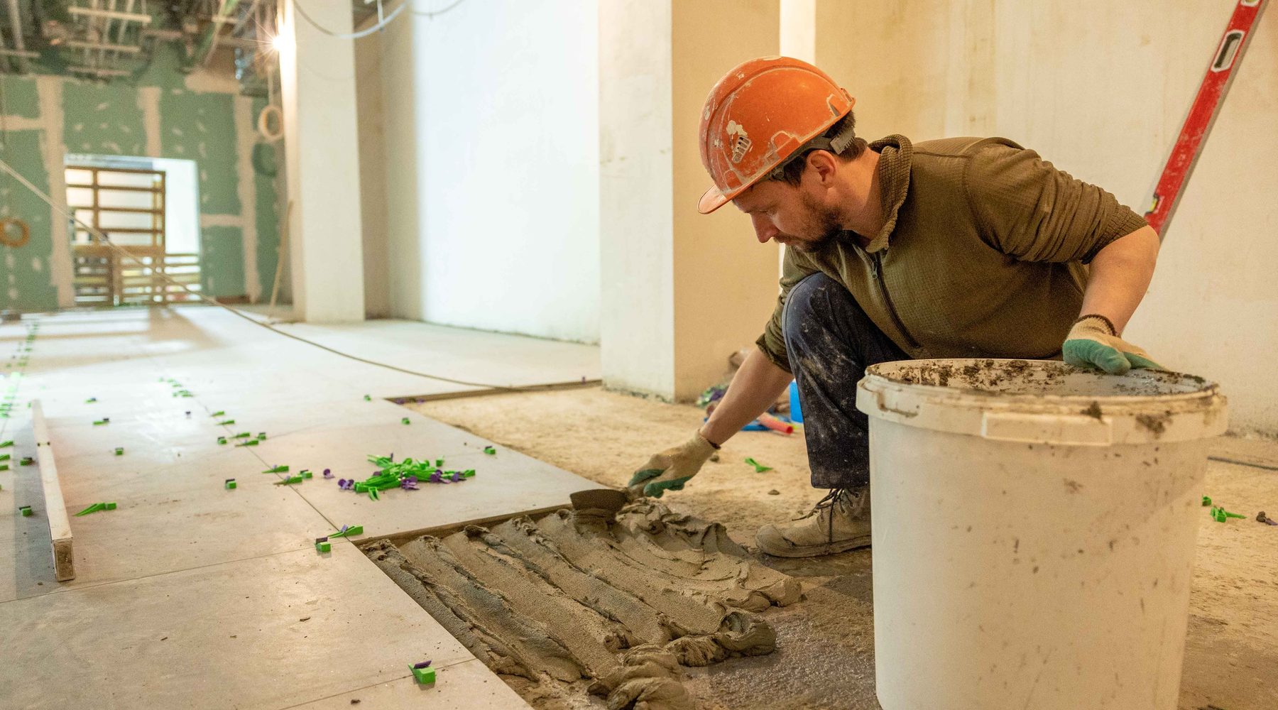 Construction worker inside an active renovation project