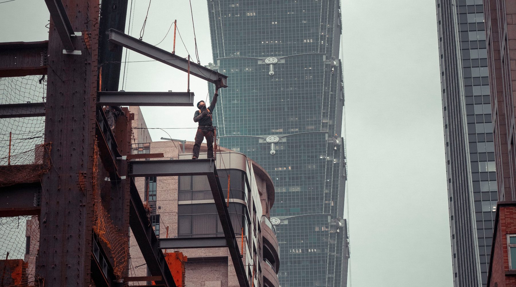 Construction worker around structural steel